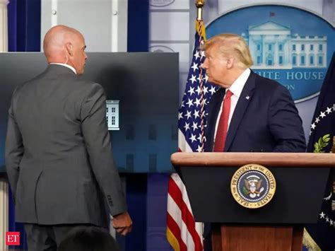 Donald Trump: Trump escorted out of briefing room by Secret Service ...