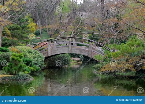 Wooden Bridge at Japanese Garden in Spring Stock Image - Image of mist ...