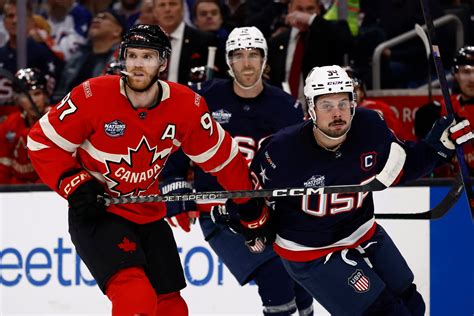 The United States Olympic men's hockey team, with Matthew Tkachuk and Connor Hellebuyck in front, react as President Donald Trump delivers his State of the Union address on February 24, 2026.