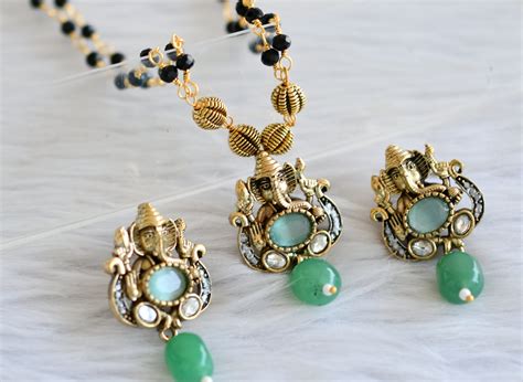 Antique black karimani chain with cz white-sea green ganesha victorian ...
