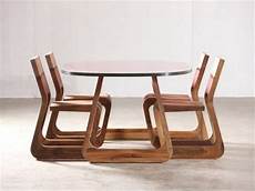 A Robust But Chair From Karim Rashid by Steek Walnut Chair By Karim Rashid A Robust But Chair From Karim Rashid