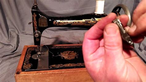 Image result for Threading Bobbin On Singer Simple