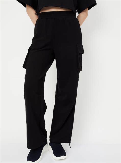 Buy Women Solid Cargo Parachute Pants Online at just Rs. 999.0 ...