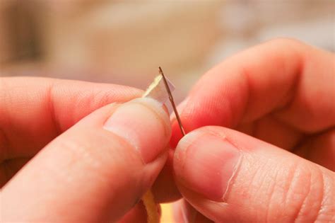 Image result for How to Thread a Needle Point Needle Using Yarn