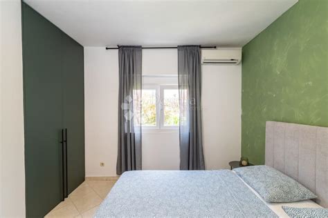 ROVANJSKA - DVOJNA KUĆA S DVA STANA, POGLED NA MORE