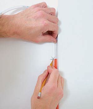 Using a Water Level for Foundation Work 的图像结果