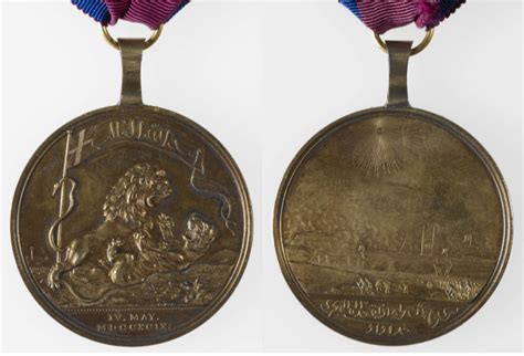 A collection of campaign medals awarded by the East India Company to ...