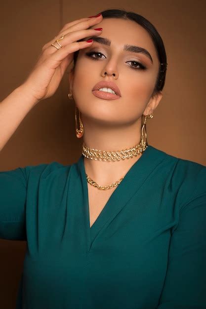 Flamenco dancer model in blue outfit and dance updo romantic posing ...