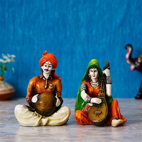 Colorful Combo of Rajasthani Craftsmen and Lady Playing a Musical Inst ...