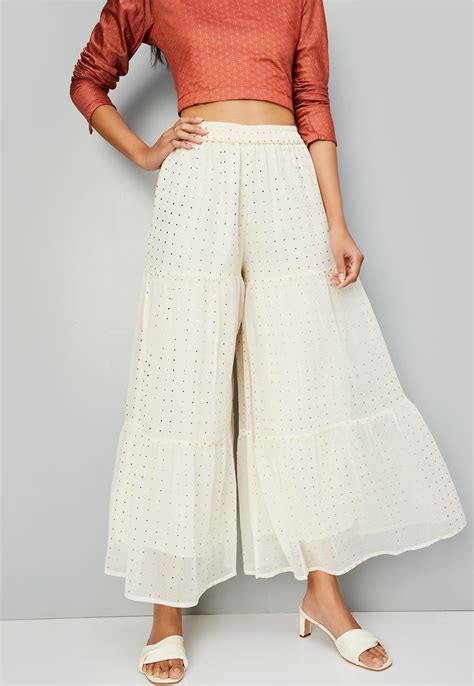 Buy Women Embellished Tiered Sharara Pants Online at just Rs. 999.0 ...