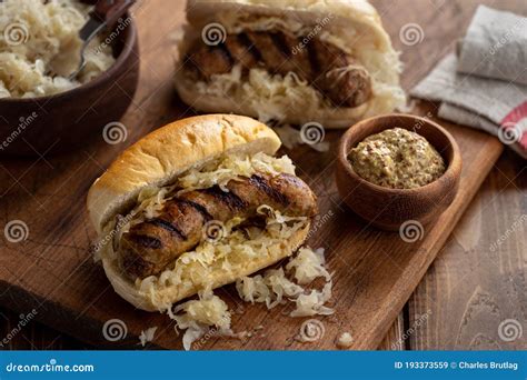 Grilled Bratwurst on a Bun stock image. Image of meat - 193373559