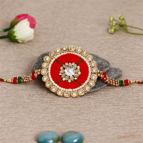 Designer Rakhi and Roli Chawal Pack - eCraftIndia Online