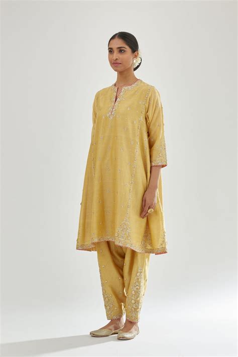 Yellow silk chanderi short kalidar kurta set with all-over delicate za ...