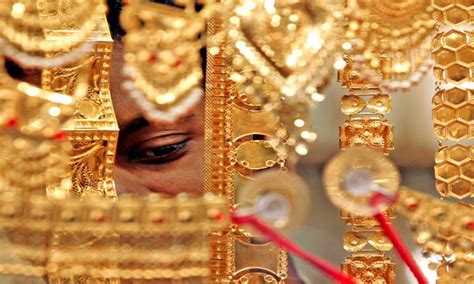 Gold surges by Rs 170 on local jewellers' demand, global cues | Gola ...