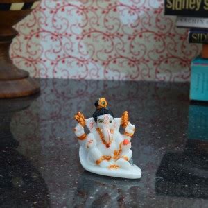 eCraftIndia Lord Ganesha with Bun Decorative Showpiece - 6.35 cm Price ...