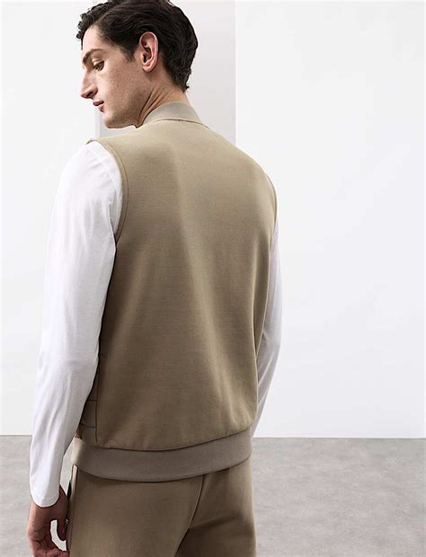 Buy Cotton Rich Zip Up Quilted Gilet with Stormwear™ at Marks & Spencer