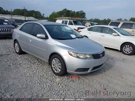 Report KNAFU4A29B5380772 KIA FORTE 2011 Silver Gasoline - price and damage history