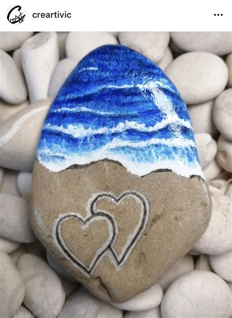 Pin on Rock on in 2024 | Beach rock art, Rock painting art, Rock ...
