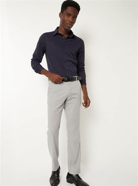 Buy Men Solid Slim Fit Formal Shirt Online at just Rs. 999.0 ...