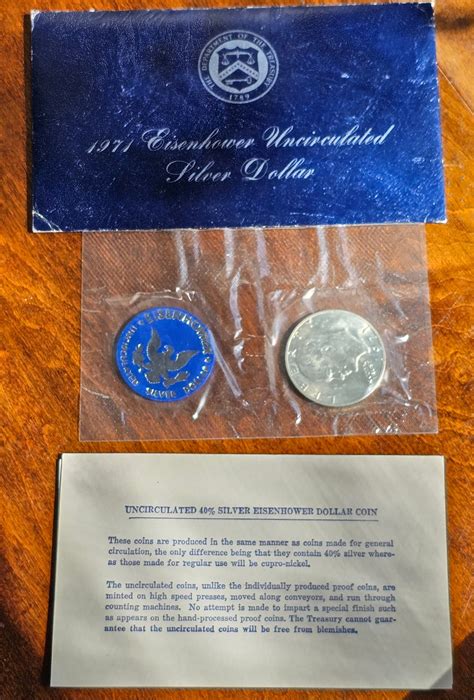 #161 - 1961 Uncirculated Eisenhower Silver Dollar #41033 | Auctionninja.com