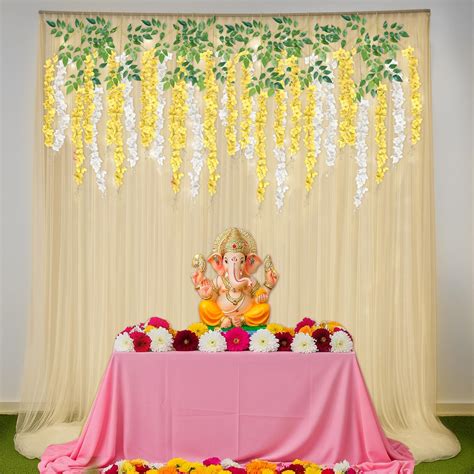 Buy Ivory Yellow Ganpati Decor in India at Best Price - Zop by Shiprocket