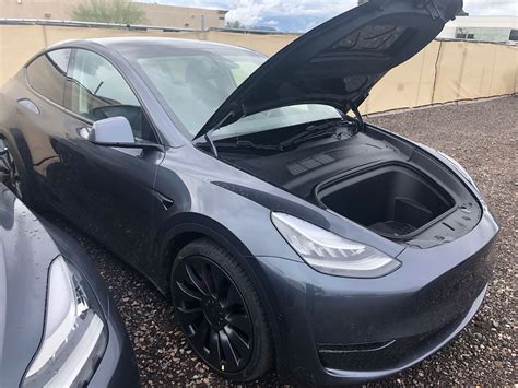 Tesla Model Y photo gallery shows the huge trunk and frunk cargo space of the electric SUV