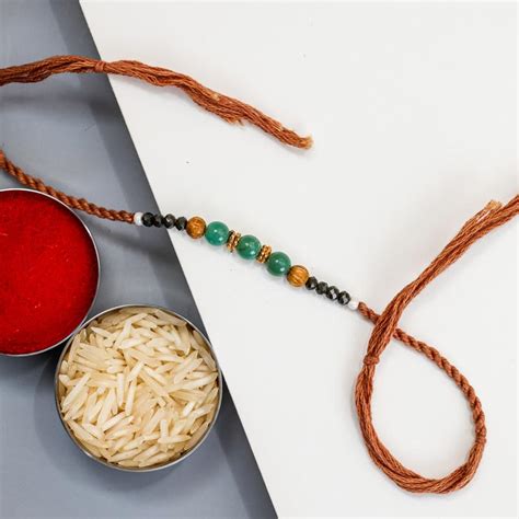 Send Aboriginal Style Decent Beads Rakhi Online - RKH22-107627 | Giftalove