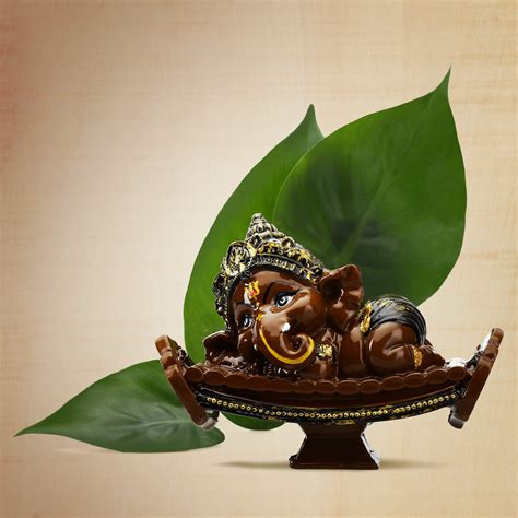 Buy GW Creations Beautiful Handcrafted Resine Little Ganesha Sitting on ...
