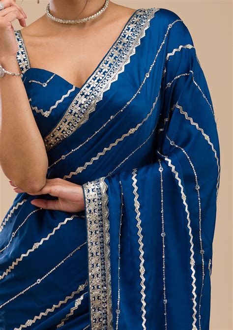 Peacock Blue Zariwork Satin Saree – Koskii