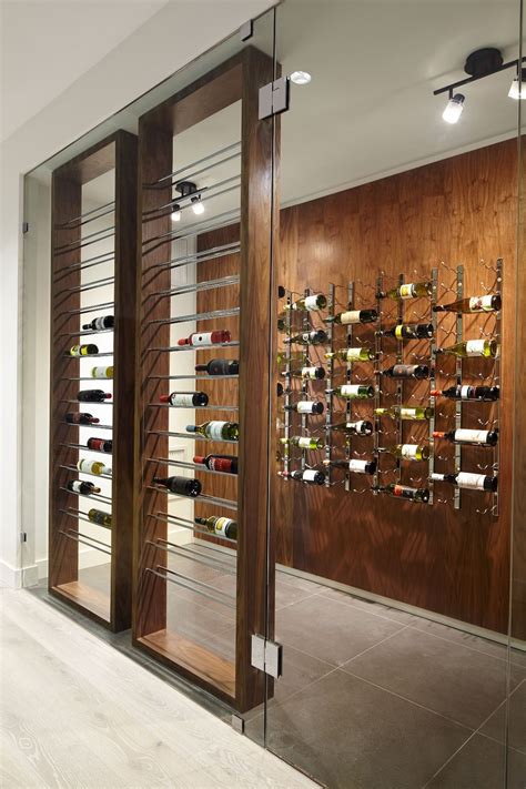 Modern Custom Wine Cellar in Vancouver with Metal Wine Racks and Rails ...