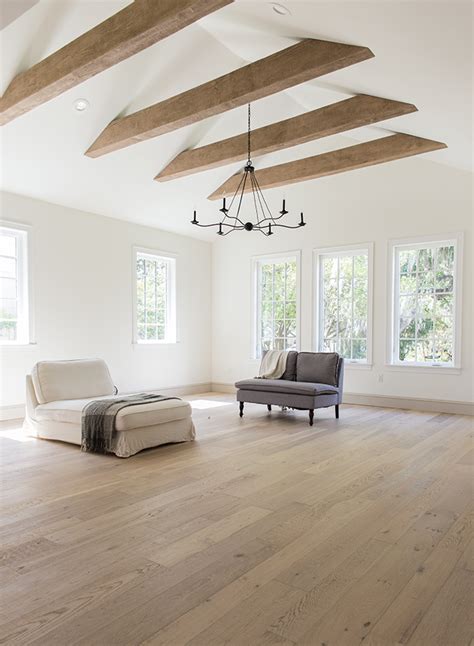 vaulted ceiling with beams living room