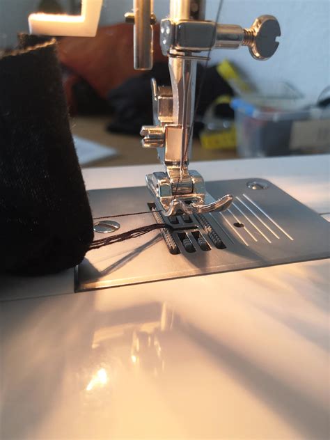 Image result for Sewing Machine Thread Stuck Under Cloth