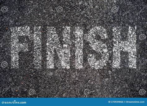 Word Finish In Line And Checked Pattern On Asphalt Texture Stock ...