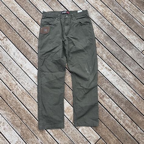 Wrangler work pants green Riggs 32-30 🛑there seems... - Depop