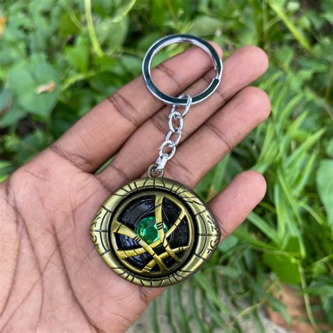 Doctor Strange Keychain - Eye of Agamotto Rotating Spiner Metal Keycha ...