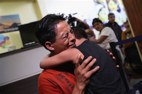 Emotional photos show kids reuniting with their deported parents