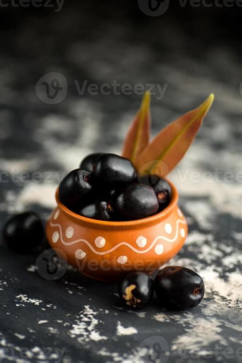 Jambolan plum or jambul or Jamun fruit, Java plum, Syzygium cumini with ...