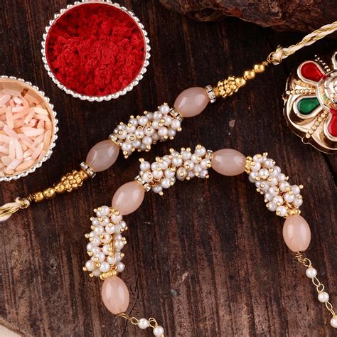 Peach Radhika Bhaiya Bhabhi Rakhi with Tilak Set and Card – Shona's Style