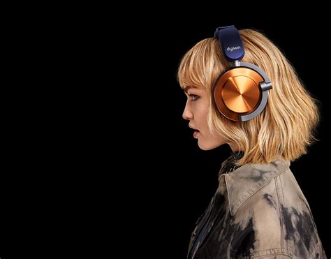 A model wearing Dyson OnTrac headphones.