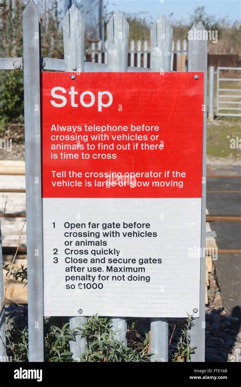Level crossing signs hi-res stock photography and images - Alamy