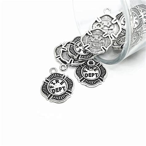 Antique Silver Fireman Badge Symbol Charms, 22x18mm | Michaels