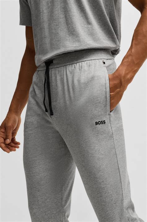 BOSS - Stretch-cotton tracksuit bottoms with embroidered logo - Grey