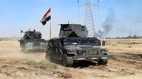 Iraqi forces make slow advance into IS-held Hit