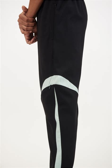 'Spaced Out' Sweatpants - Black & Orbit-Green. Unisex – BISKIT