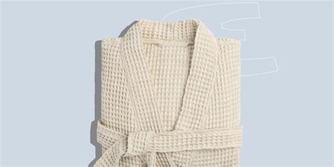 The Ritz-Carlton bath robes hanging in luxury bathroom
