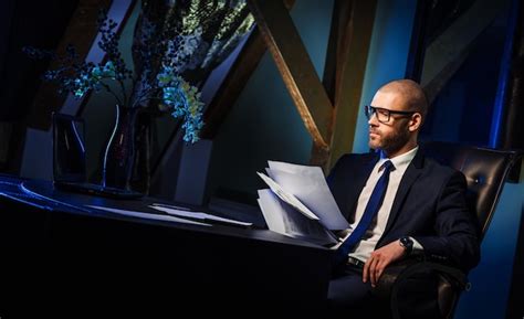 Businessman Working at Desk 的图像结果