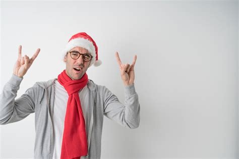 Christmas concepts - young man gesturing | Premium Photo