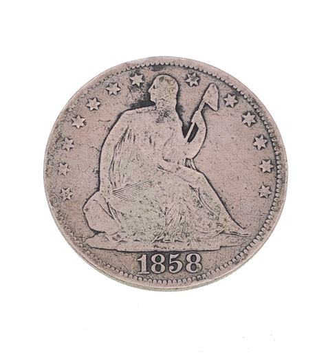 Lot - 1858 SEATED LIBERTY SILVER HALF DOLLAR