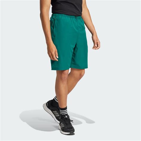 Clothing - Bloom Sky Print Woven Shorts - Green | adidas Kuwait
