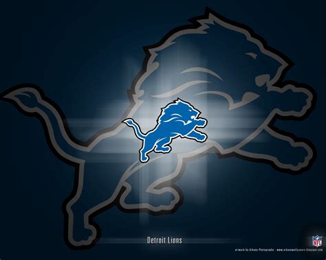 the detroit lions logo on a dark background